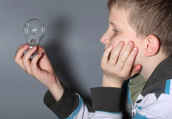 Child with bulb — Stock Photo, Image