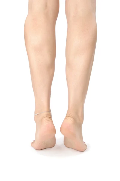 女性の足と足の白で隔離 — ストック写真