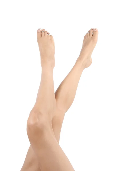 Donna gambe e piedi isolati su bianco — Foto Stock