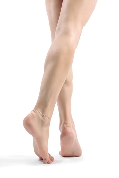 Γυναίκα τα πόδια και τα πόδια απομονωθεί σε λευκό — Φωτογραφία Αρχείου