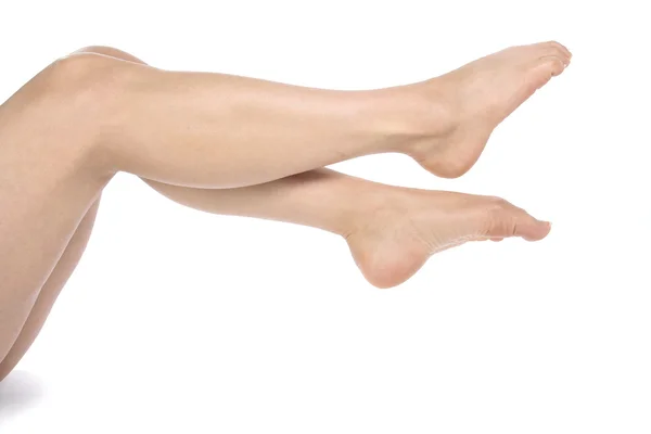 Γυναίκα τα πόδια απομονωθεί σε λευκό φόντο — Φωτογραφία Αρχείου