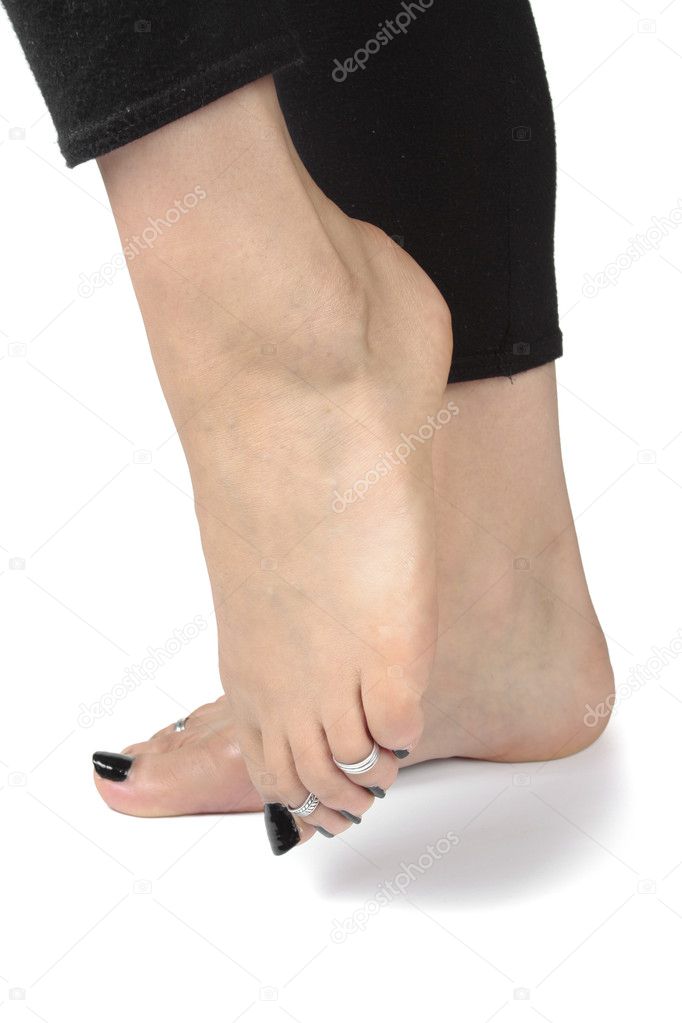 Woman feet over white background