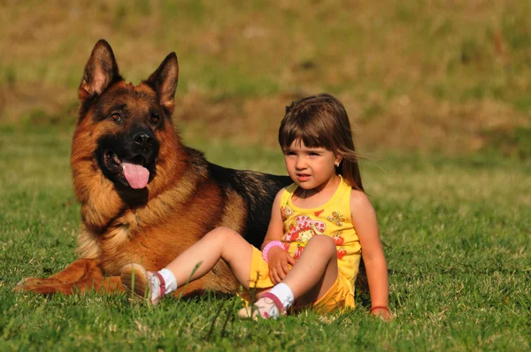 Little happy girl with dog — Stock Photo, Image