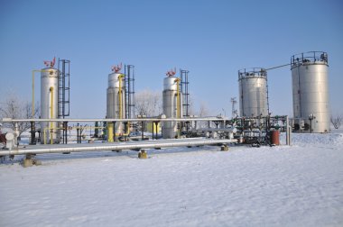 Refinery in winter scenery clipart
