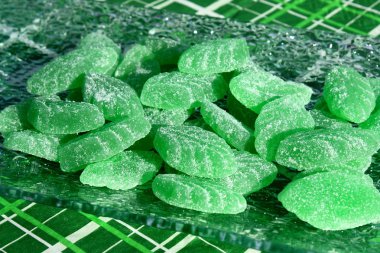 Green mint leaves candies clipart