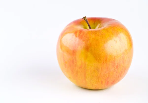 En enda fuji äpple — Stockfoto