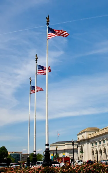 Three American Flags Waving Proudly on Tall Flagpoles — Stock Photo, Image