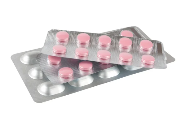 Tabletki wyizolowane na białym — Zdjęcie stockowe