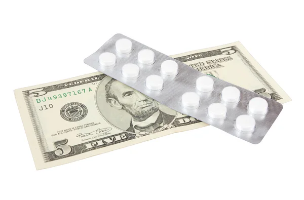 Tabletler ve para — Stok fotoğraf