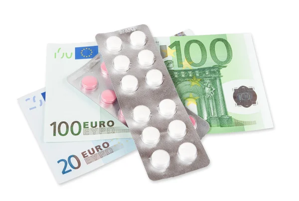 Tabletten en geld — Stockfoto