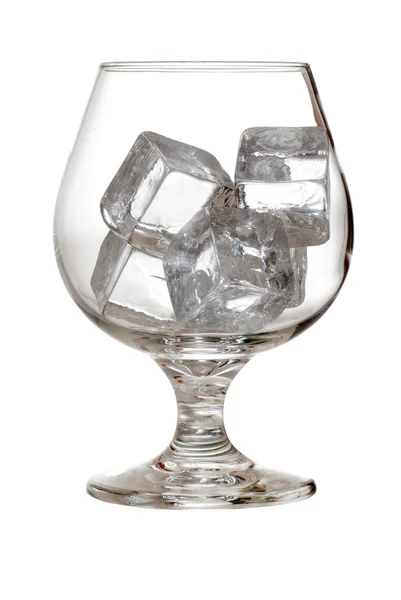 Isolated brandy glass with ice cubes — Stock Photo, Image
