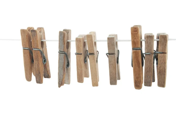 Espinhos de roupa na corda — Fotografia de Stock