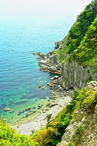 Crystalline sea beach in japan sea Island Petrov — Stock Photo, Image