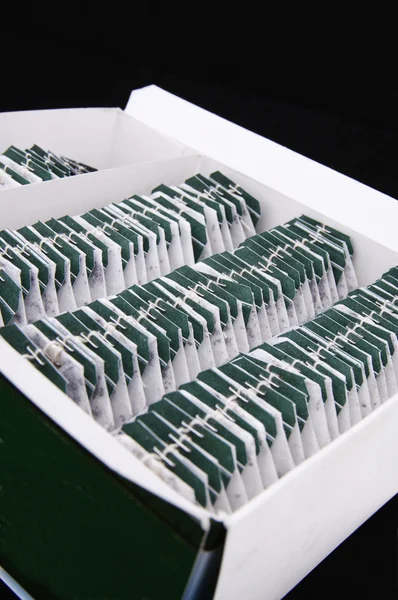 Un sacco di bustine di tè organizzare in scatola — Foto Stock