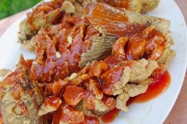 Chinese food. Fried carp in sour sweet sauce, clipart