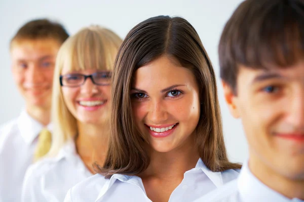 Happy business woman with her colleagues Stock Image