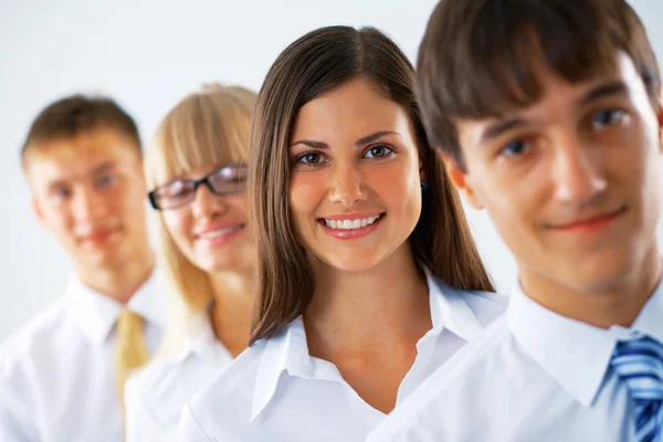 Happy business woman with her colleagues Royalty Free Stock Images