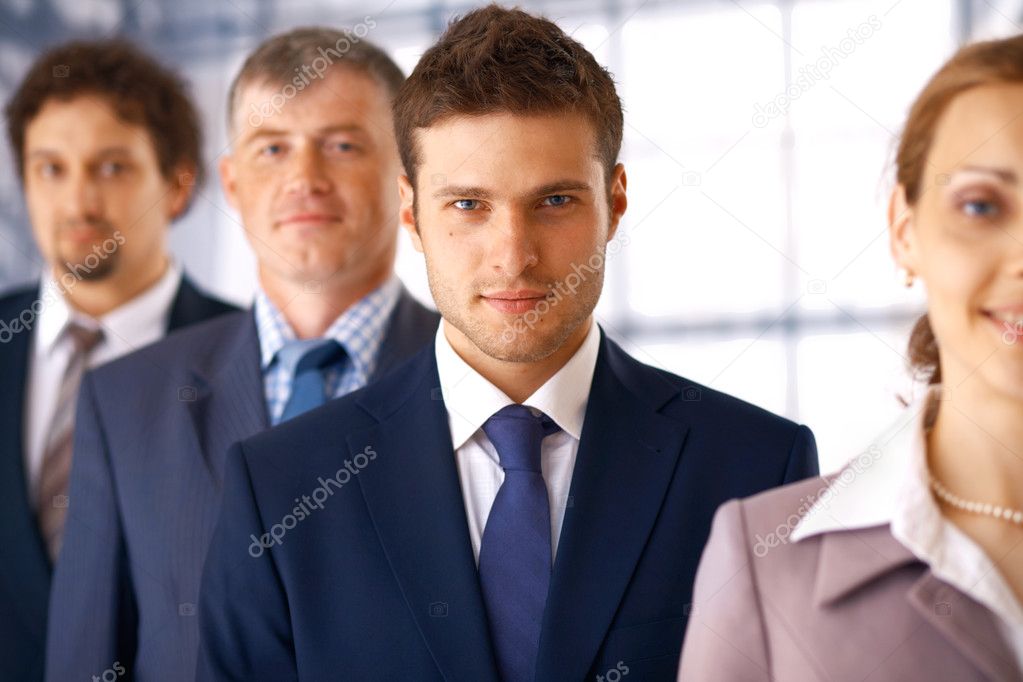 Businessman With Colleagues