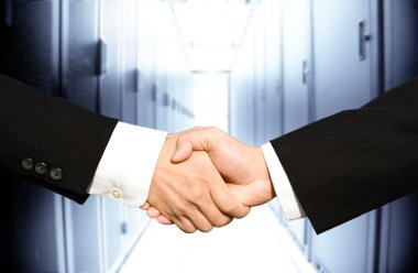 Businessmen shaking hands clipart