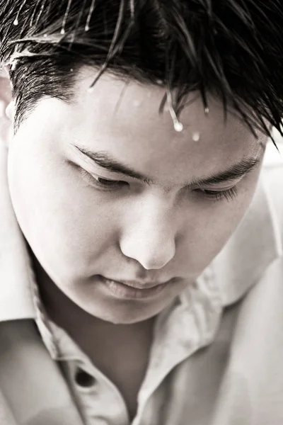 Deprimido jovem asiático masculino — Fotografia de Stock