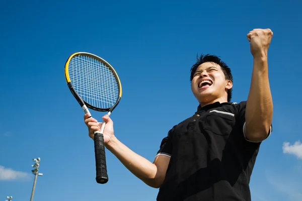 Asian tennis player joy in victory — Stock Photo, Image