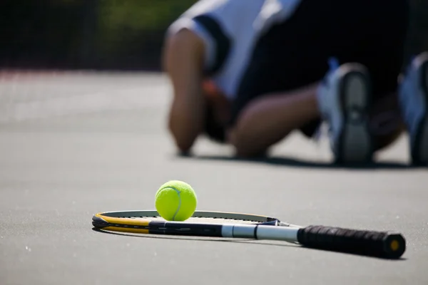 Ledsen tennisspelare efter nederlag — Stockfoto