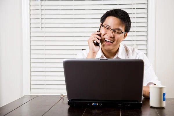 Asian entrepreneur on the phone — Stock Photo, Image