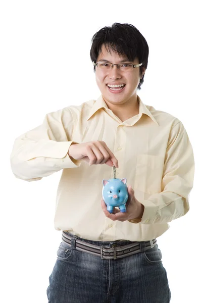 Азиатский бизнесмен экономит деньги — стоковое фото