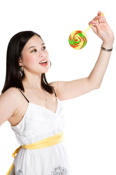 Beautiful asian woman and lollipop — Stock Photo, Image