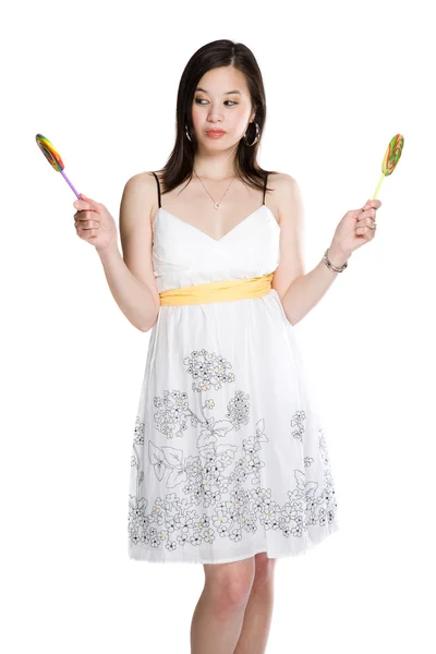 Beautiful asian woman and lollipops — Stock Photo, Image