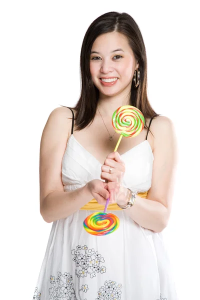 Hermosa mujer asiática y piruletas — Foto de Stock