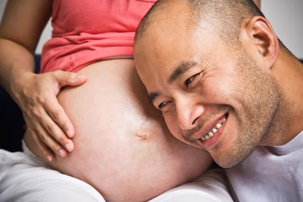 Happy expecting asian couple — Stock Photo, Image