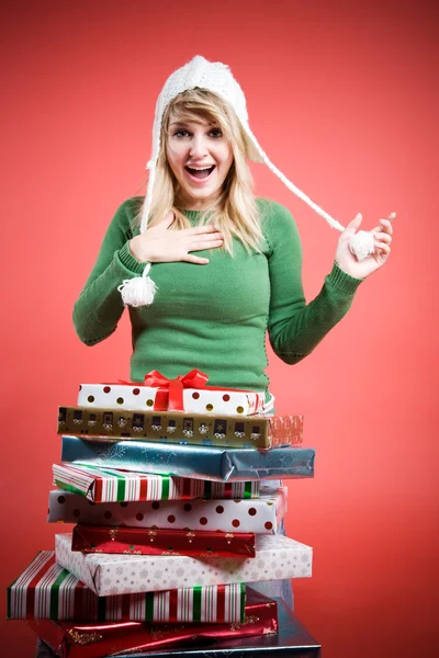 Caucasian girl receiving gifts — Stock Photo, Image