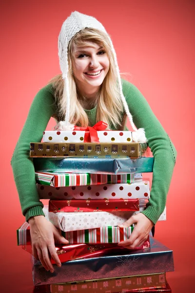 Caucasian girl with gifts — Stock Photo, Image