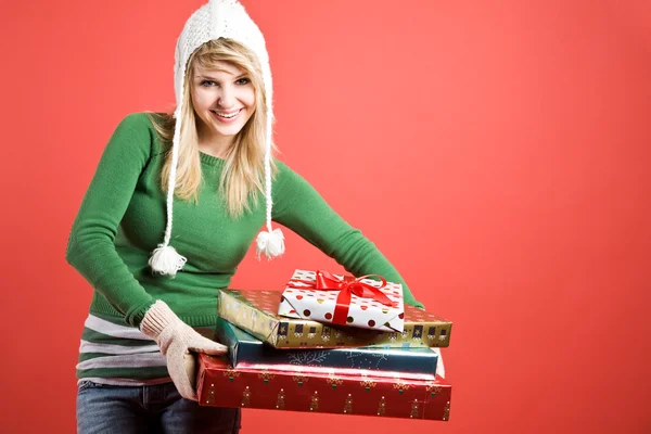 Caucasian girl with gifts on holiday — Stock Photo, Image