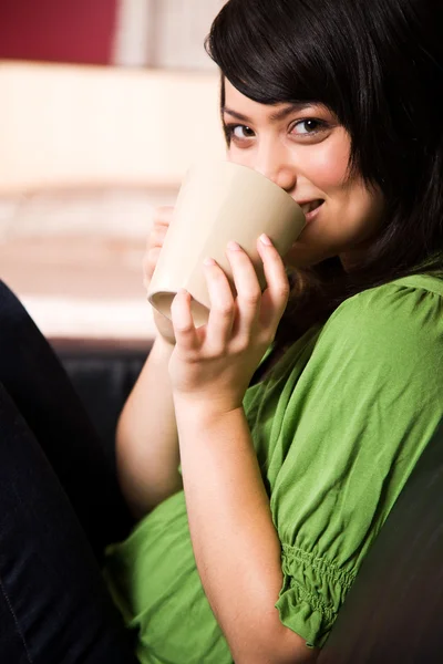 Asian girl with coffee cup — Stock Photo, Image