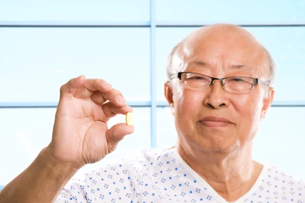 Старший азіатських охорони здоров'я — стокове фото