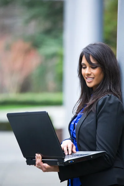 Indian businesswoman with laptop — Stock Photo, Image