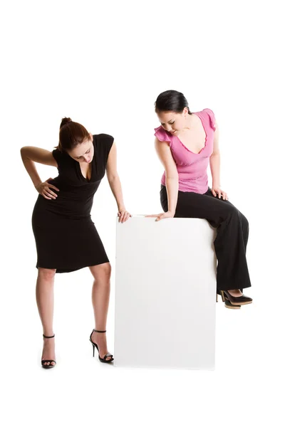 Businesswomen and billboard — Stock Photo, Image