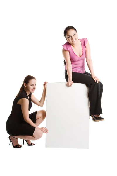 Businesswomen and billboard — Stock Photo, Image