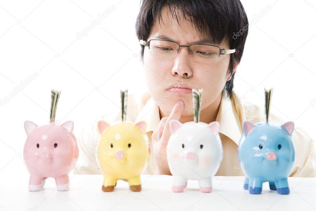Asian businessman saving money