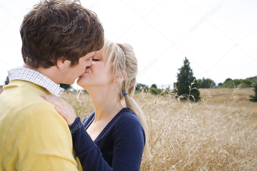 Young caucasian couple kissing