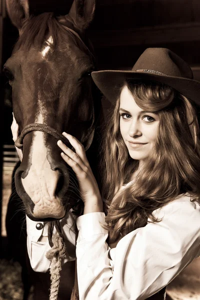 Beautiful girl with her horse — Stock Photo, Image