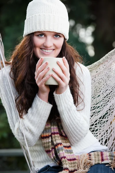 Beautiful teenager drinking coffee — Stock Photo, Image