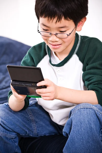 Boy playing games — Stock Photo, Image