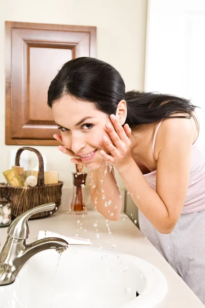 stock image Woman washing face