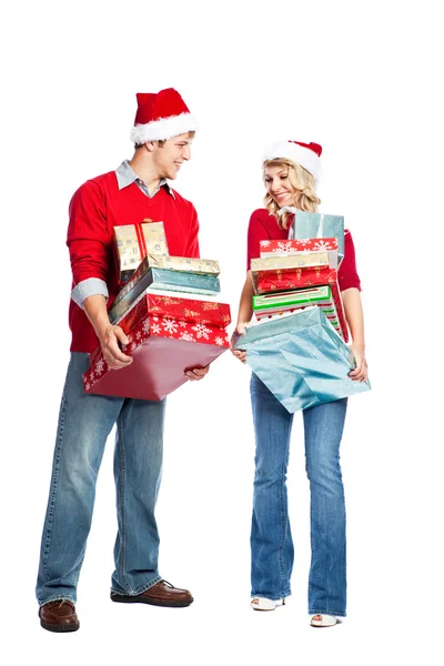 Christmas shopping couple carrying gifts — Stock Photo, Image