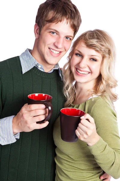 Caucásico pareja sosteniendo tazas de café —  Fotos de Stock
