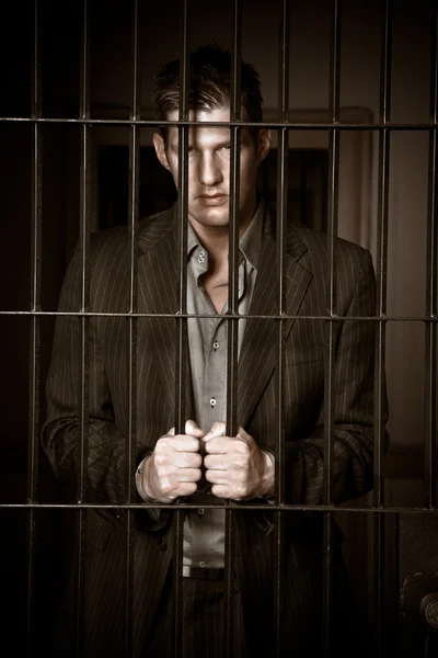 Бізнесмен у в'язниці — стокове фото