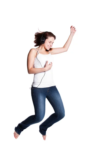 Красивая женщина прыгает от радости — стоковое фото